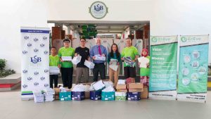 Group photo of ISB's Executive Principal Mr. Dominic Morley, General Manager Ms. Vienna Law, EnEvo’s General Manager Mr. Tan Kheng Tong, ISB Eco Coordinator Mr. David Mark Evans, and ISB students from the Eco Committee and Eco Warriors during the paper recycling campaign.