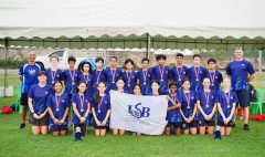 Members of the ISB U13 FOBISIA Team pose together after an outstanding performance at the 2025 FOBISIA Games. The team won an impressive 79 medals in total, with every student earning at least one medal.