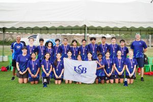 Members of the ISB U13 FOBISIA Team pose together after an outstanding performance at the 2025 FOBISIA Games. The team won an impressive 79 medals in total, with every student earning at least one medal.